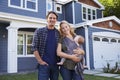 Portrait Of Family Standing Outside House Royalty Free Stock Photo