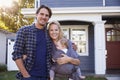 Portrait Of Family Standing Outside House Royalty Free Stock Photo