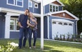 Portrait Of Family Standing Outside House Royalty Free Stock Photo