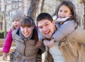 Portrait of family with two girls outdoors Royalty Free Stock Photo