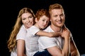 Portrait of family in white t-shirts hugging each other Royalty Free Stock Photo