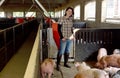 Portrait of a farm woman on a pig farm