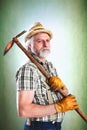 Portrait of farmer with his mattock