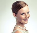 Portrait, fashion and beauty of happy woman in studio on a gray background mockup space. Face, freckles and