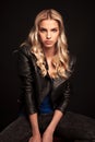 Portrait of a fashion biker woman in leather jacket Royalty Free Stock Photo