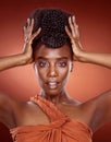 Portrait, fashion and black woman with beauty, hair style and confident girl against a red studio background. Face