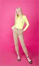 Portrait of fashion blonde model girl young woman wearing stylish isolated on a pink