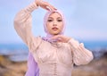 Portrait, fashion or faith with a saudi woman outdoor in a scarf for religion or contemporary style. Islam, face or Royalty Free Stock Photo