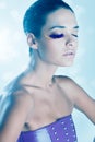 Portrait of fashion model with bird feather eyelashes creative makeup eyes closed Royalty Free Stock Photo