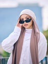 Portrait, fashion or sunglasses with a muslim woman in dubai wearing a cap and scarf for contemporary style. Islamic Royalty Free Stock Photo