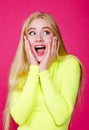 Portrait of fashion surprised blonde model girl young woman wearing stylish isolated on a pink