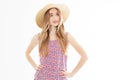 Portrait of Fashion Young woman in Dress. Pretty Girl in Hat. Female model in Stylish Summer Outfit. Vanilla Color. Beautiful Lady Royalty Free Stock Photo