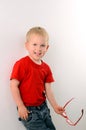 Portrait of fashionable little boy with glasses Royalty Free Stock Photo