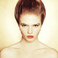 Portrait of fashionable model with retro hairdo, arty make-up Royalty Free Stock Photo