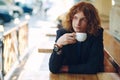 Portrait fashionable reddish man drinking coffee Royalty Free Stock Photo