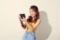 Portrait of fashionable young photographer with  digitalcamera Royalty Free Stock Photo