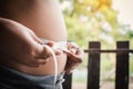 Portrait fat boy measuring tape of stomach Royalty Free Stock Photo