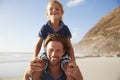 Portrait Of Father Carrying Son On Shoulders On Beach Vacation Royalty Free Stock Photo