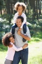 Portrait Of Father With Daughters In Countryside