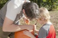 Portrait of a father and son carving a pumpkin Royalty Free Stock Photo