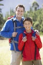 Portrait Of Father And Son On Hike In Beautiful Countryside Royalty Free Stock Photo