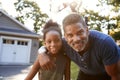 Portrait Of Father And Son Playing Basketball On Driveway Royalty Free Stock Photo