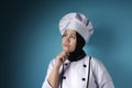 Female Asian Chef Thinking Something