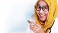 Muslim Female Doctor Holding Injection Syringe