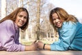 portrait of female athlete couple having fun while relaxing outdoors Royalty Free Stock Photo