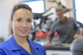 portrait female auto repair worker