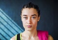 Portrait of female boxer posing in gym Royalty Free Stock Photo