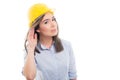 Portrait of female constructor showing can`t hear you