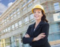 Portrait of Female Contractor Wearing Hard Hat at Construction S