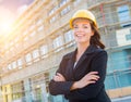 Portrait of Female Contractor Wearing Hard Hat at Construction S