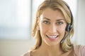 Portrait Of Female Customer Service Representative Royalty Free Stock Photo