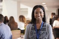 Portrait Of Female Delegate During Break At Conference Royalty Free Stock Photo