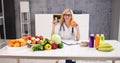 Portrait Of Female Dietician With Vegetables Royalty Free Stock Photo