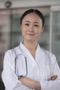 Portrait of female doctor with arms crossed outside of the hospital Royalty Free Stock Photo