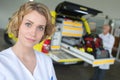 Portrait female doctor standing in front ambulance