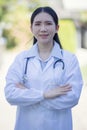 Portrait Of Female Doctor Standing Outside Hospital Royalty Free Stock Photo