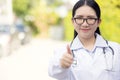 Portrait Of Female Doctor Standing Outside Hospital Royalty Free Stock Photo