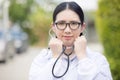 Portrait Of Female Doctor Standing Outside Hospital Royalty Free Stock Photo