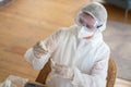 Portrait of female doctor with vaccine for vaccination at home Royalty Free Stock Photo