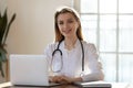 Portrait of female doctor work on laptop in hospital Royalty Free Stock Photo