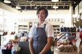 Portrait Of Female Employee Working In Delicatessen