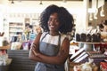 Portrait Of Female Employee Working In Delicatessen