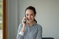 Portrait Female Entrepreneur. Cheerful asian Businesswoman Talking On Phone In Modern Office. Royalty Free Stock Photo