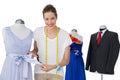 Portrait of a female fashion designer and mannequin Royalty Free Stock Photo