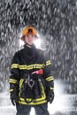 Portrait of a female firefighter standing and walking brave and optimistic.