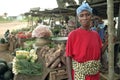 Portrait of female Ghanaian greengrocer on market